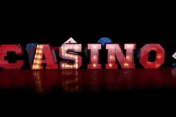 HI76 Live Casino — Join thrilling real-dealer tables A professional dealer in a tuxedo greeting players at the roulette table, symbolizing the authentic live casino feel at HI76.